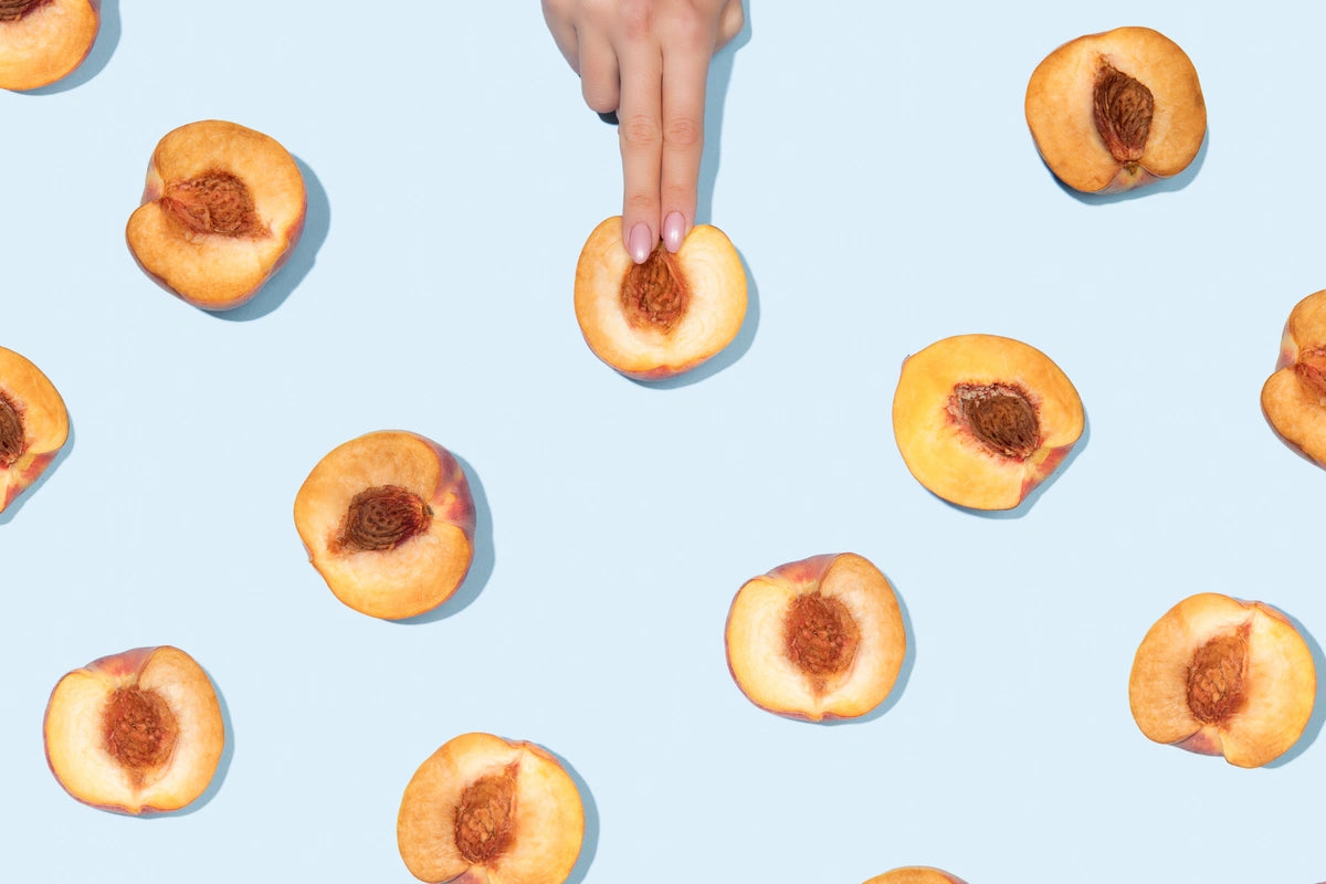 peaches on a pastel blue background