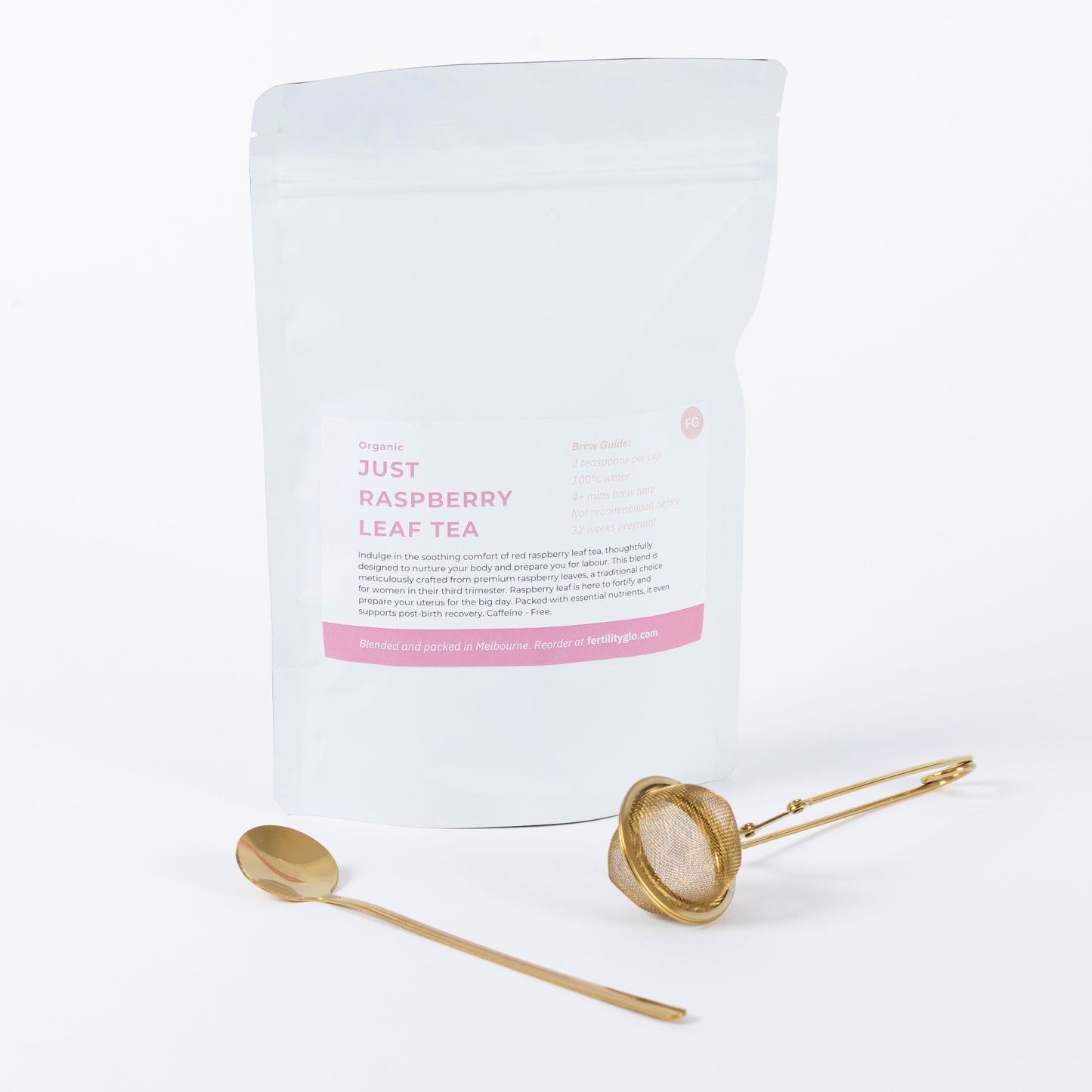 raspberry tea pouch with tea accessories 