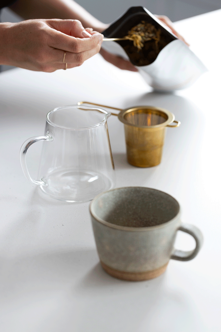 Pouring Morning Glo Tea in teapot