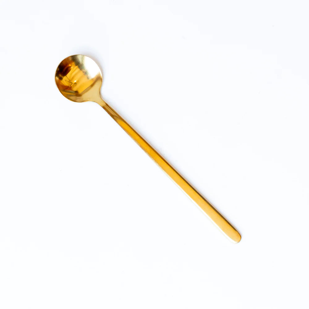 gold stirring spoon
